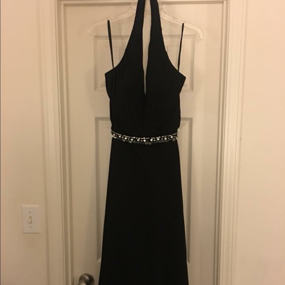 Long, black halter evening dress.